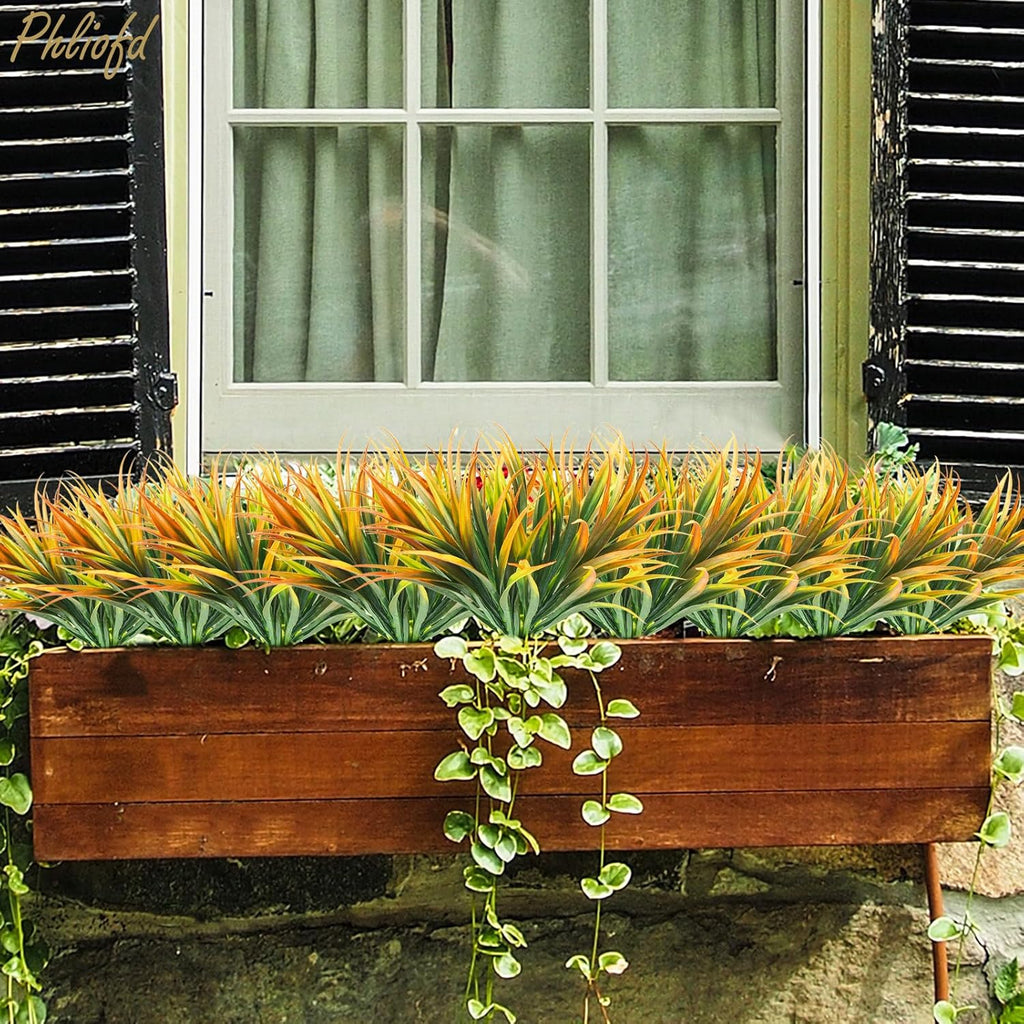 16Pcs Artificial Grass Fake Plants 17.3in Outdoor Plastic Plants UV Resistant Greenery Fake Grass for Home Window Garden Office Patio Hanging Planter Pathway Front Porch Décor Orange Yellow