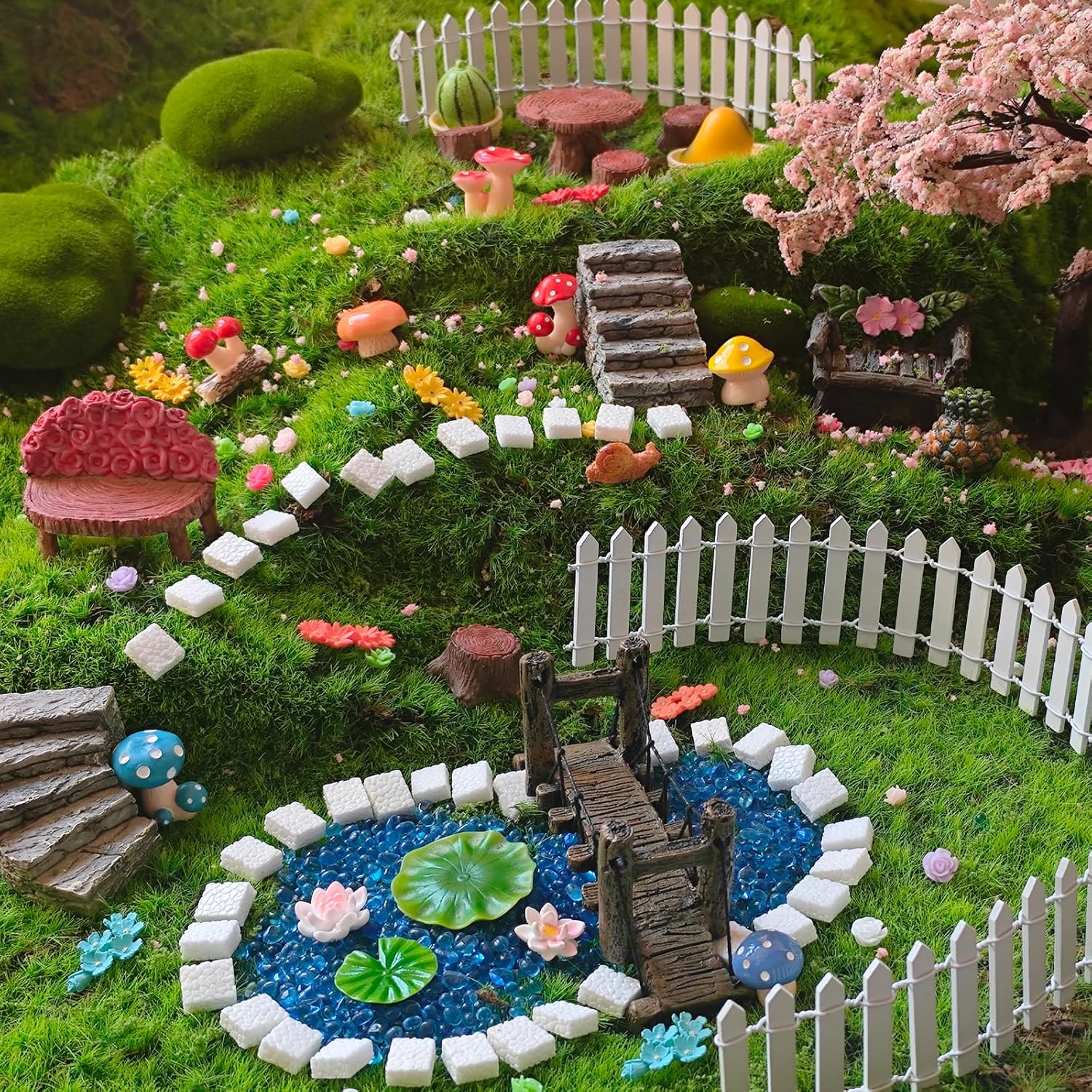 Kai Dream Fairy Garden Accessories, Fairy Garden Kit, 118 Pieces of Miniature Decor: Mushrooms, Bridge, Steps, Moss, Furniture Figurines, Fake Fence, Flowers, and Blue Crystal Gravel